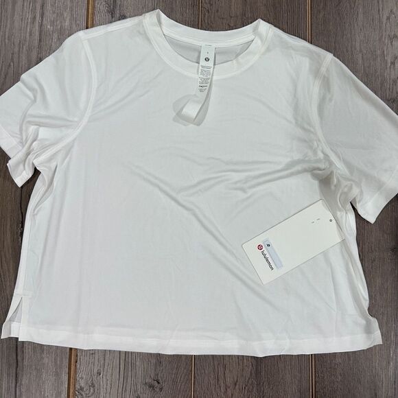 lululemon athletica Tops - New Ultralight
Waist-Length T-Shirt